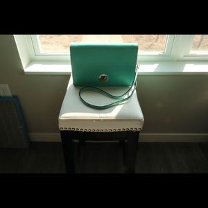 Kate Spade turn lock closure